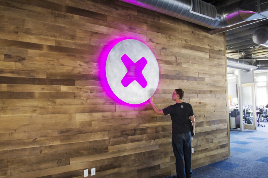 Kyle selecting an electric magenta on his epic LED lined logo.